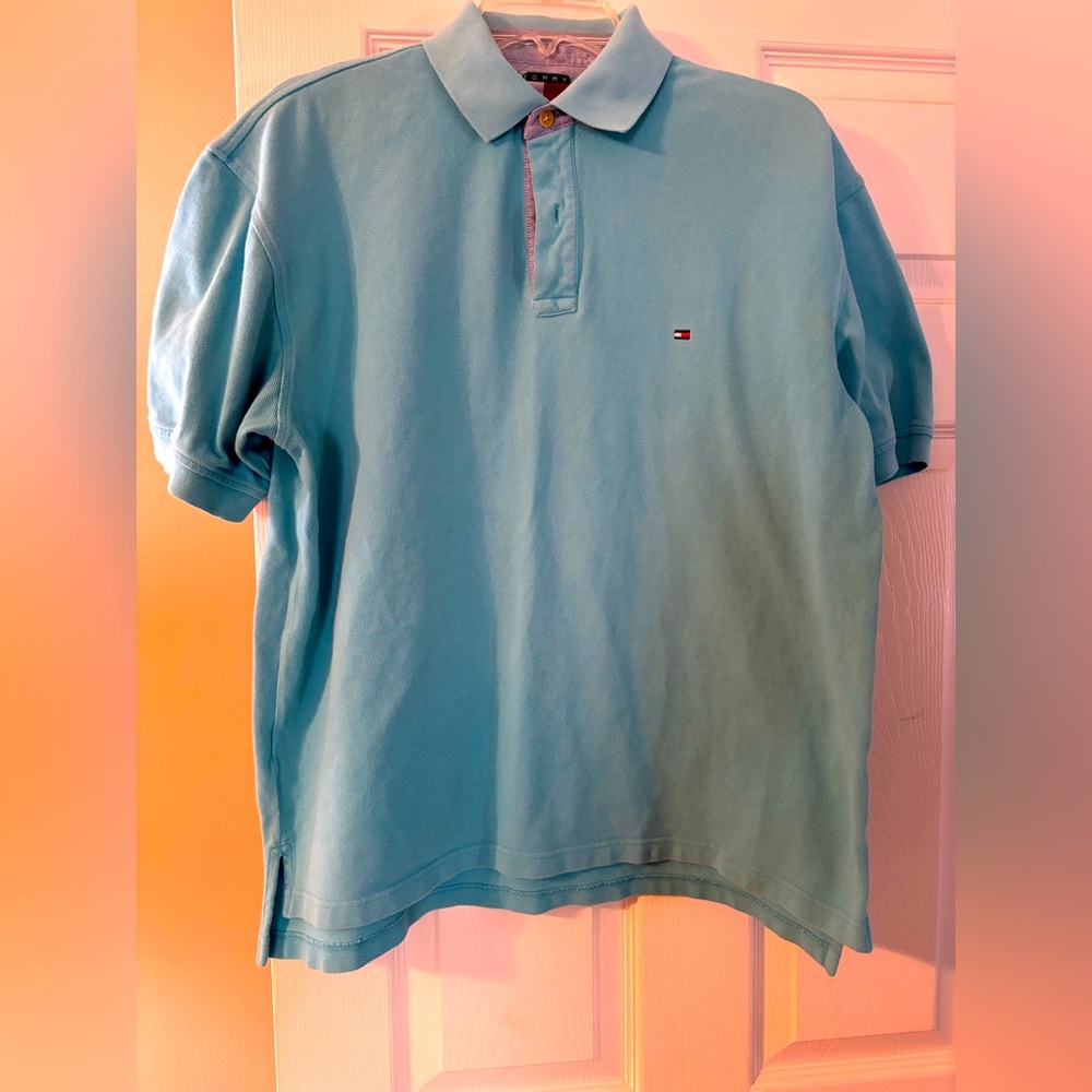 Like new condition. Turquoise blue Tommy Hilfiger knit polo shirt. Size L.
